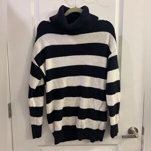 Large striped turtleneck sweater